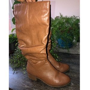 Below the knee high boots